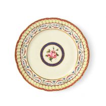 A Sèvres plate, the porcelain 18th century, probably later decorated with a central roundel of