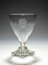 A glass rummer of naval interest, early 19th century, the funnel bowl engraved with shield panels