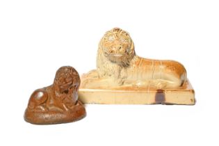Two brown stoneware lions, 19th century, the smaller possibly Newcastle, naively modelled with