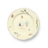 A Chantilly style plate, 19th century, painted in Kakiemon enamels with Chinese boys fishing and