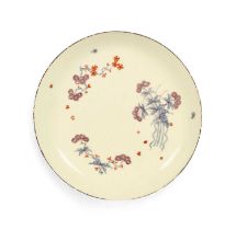 A rare Bow saucer dish or stand, c.1758, decorated in a combination of Kakiemon and famille rose
