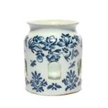 A rare English delftware night light holder, c.1770, probably London, the cylindrical jar shape with