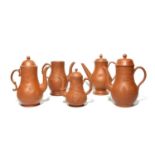 Five English redware coffee pots, c.1760-70, four with covers, of baluster form, the smallest