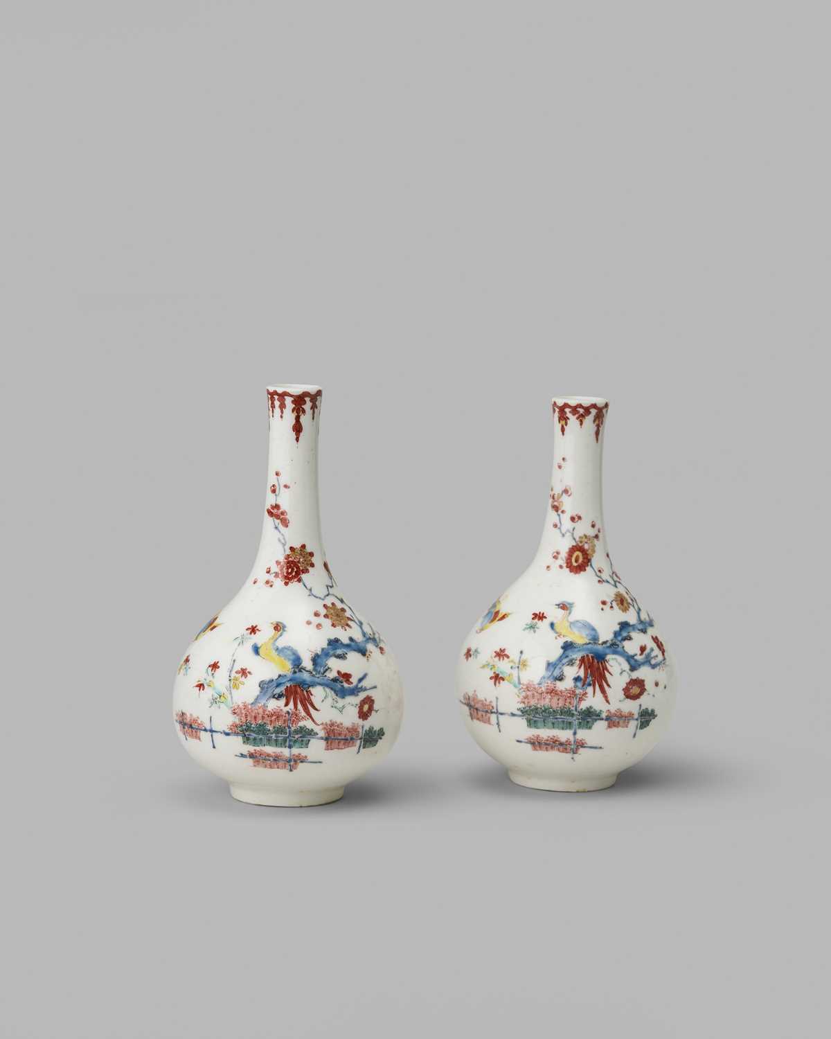 A rare pair of Bow bottle vases, c.1755, well painted in Kakiemon enamels, each with a long-tailed