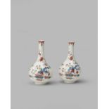 A rare pair of Bow bottle vases, c.1755, well painted in Kakiemon enamels, each with a long-tailed