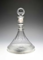 A ship's decanter and stopper, c.1800, the spreading base cut with vertical flutes, the tapering