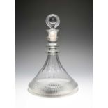 A ship's decanter and stopper, c.1800, the spreading base cut with vertical flutes, the tapering