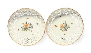 A pair of Meisen reticulated dishes, mid 18th century, the circular forms painted to the wells