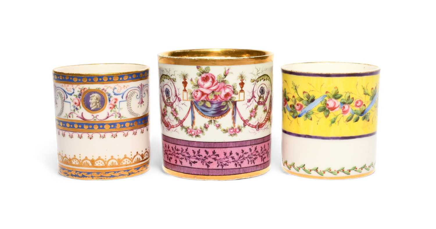 Three Sevres coffee cans (gobelets litron), c.1779-1800, the largest painted with pink roses
