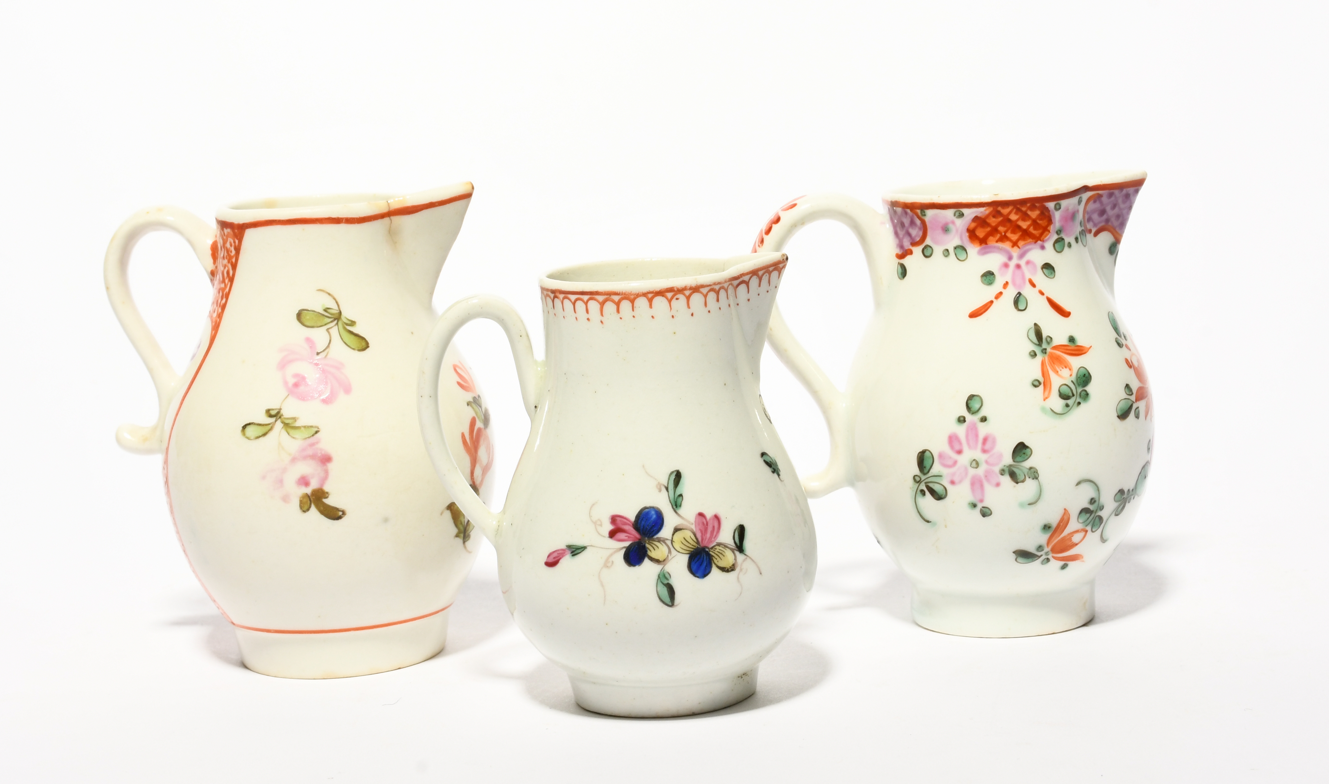 Three English porcelain milk jugs, c.1770-90, two Lowestoft and painted with flowers and trellis - Image 2 of 2