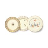 Three Derby plates or dishes, c.1780-1800, one with an armorial shield to the well, the rim with a