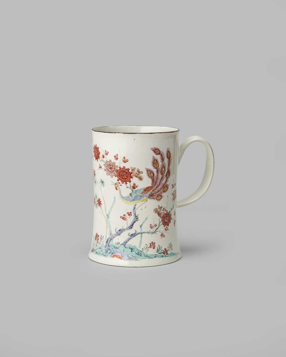A good and rare Vauxhall mug, c.1755, the cylindrical form rising from a flared foot, well painted