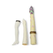 A German porcelain white-glazed pipe tamper, 18th century, modelled as the leg of a lady, a German