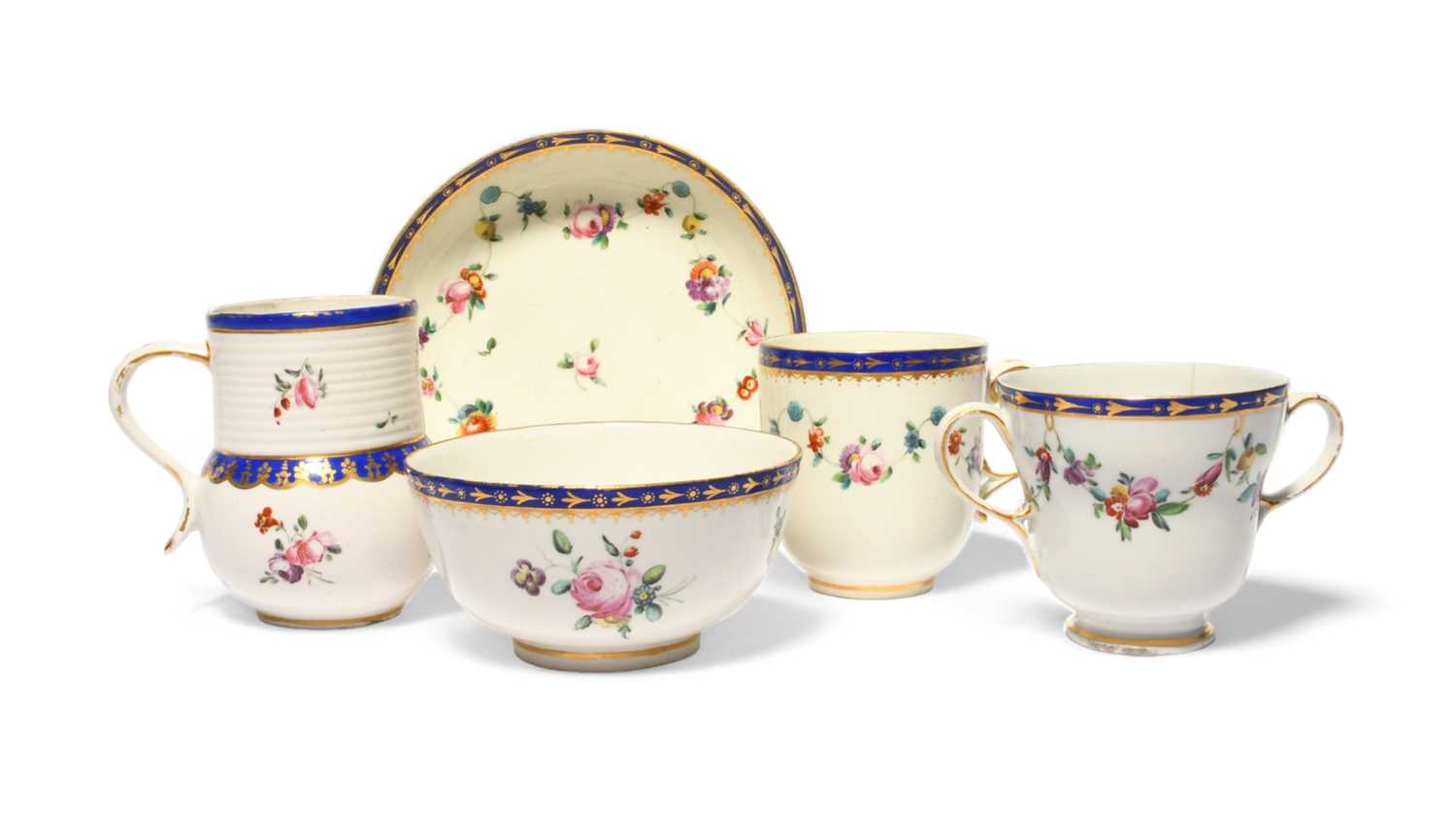 A group of Chelsea-Derby teawares, c.1780, including a thistle-shaped mug, a two-handled cup, a