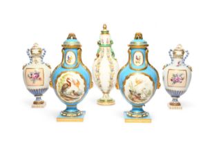 A pair of Coalport vases and covers, 19th century, in the Sèvres manner, painted with panels of