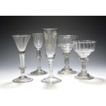 Five various English glasses, c.1740-60, including two sweetmeat glasses raised on pedestal stems