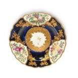 A Chelsea cabinet plate, c.1760-65, painted to the rim with three large panels of fruit including