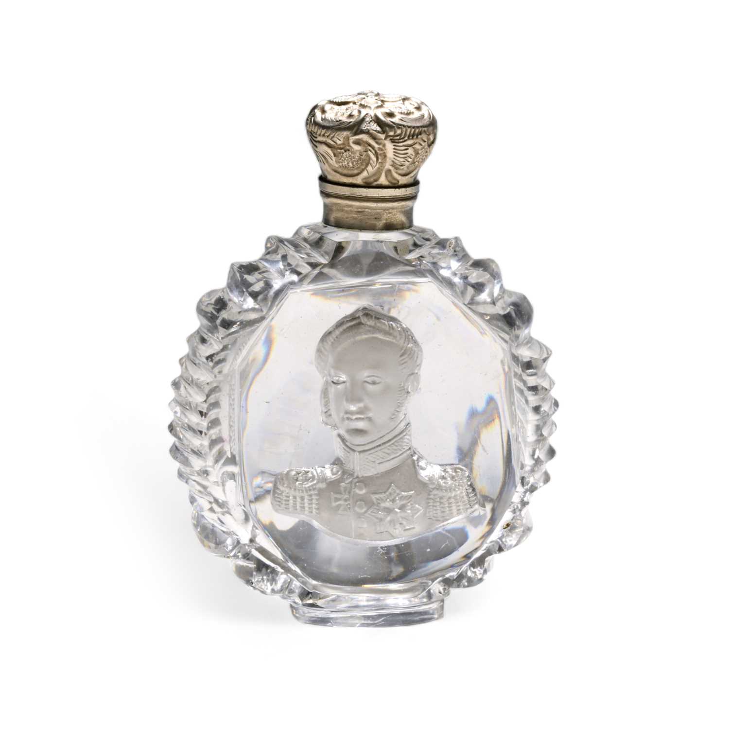 A cut glass sulphide scent bottle, 19th century, set with the head and shoulders portrait of a