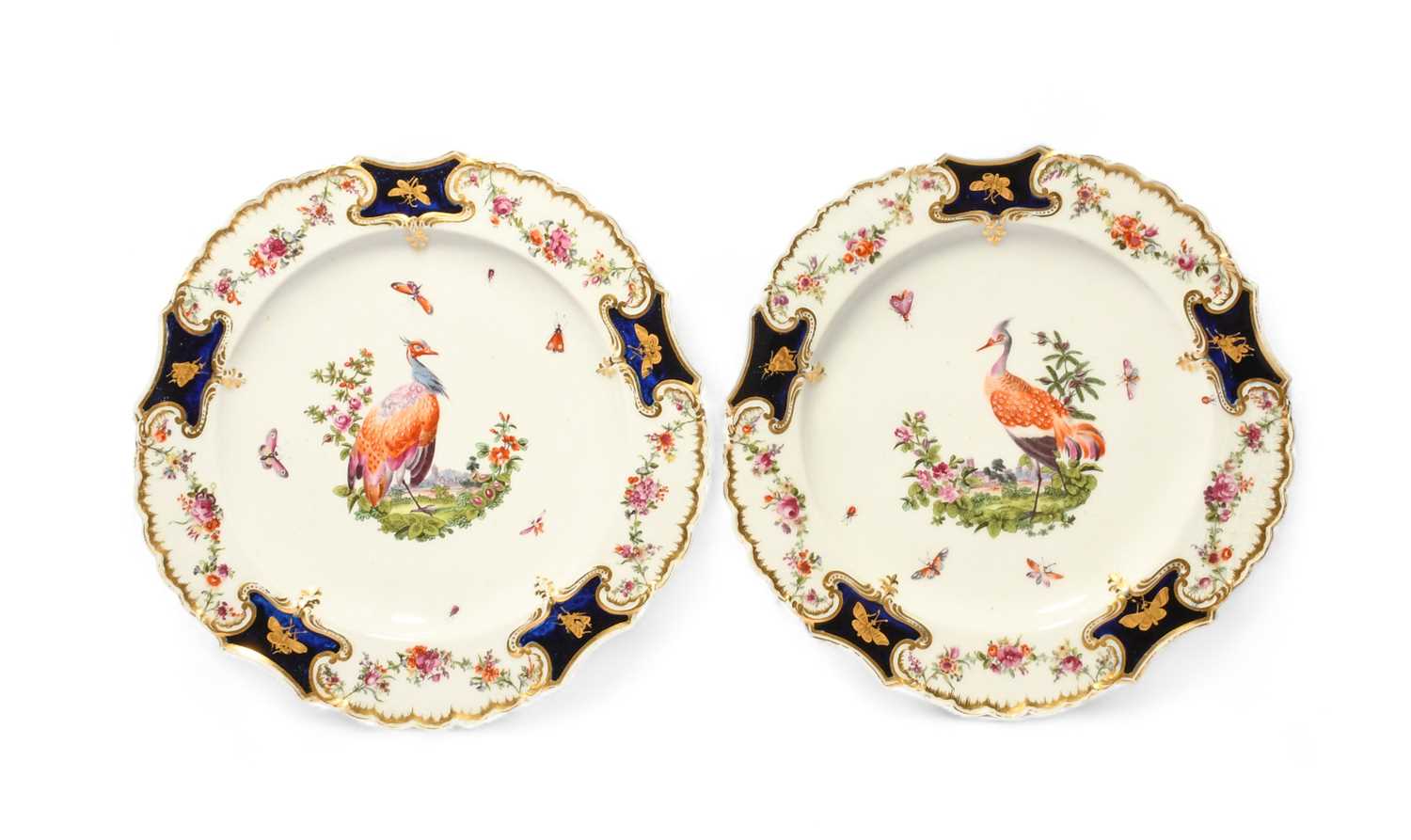 A pair of Chelsea plates of Mecklenburg-Strelitz type, c.1764, the moulded borders with flower