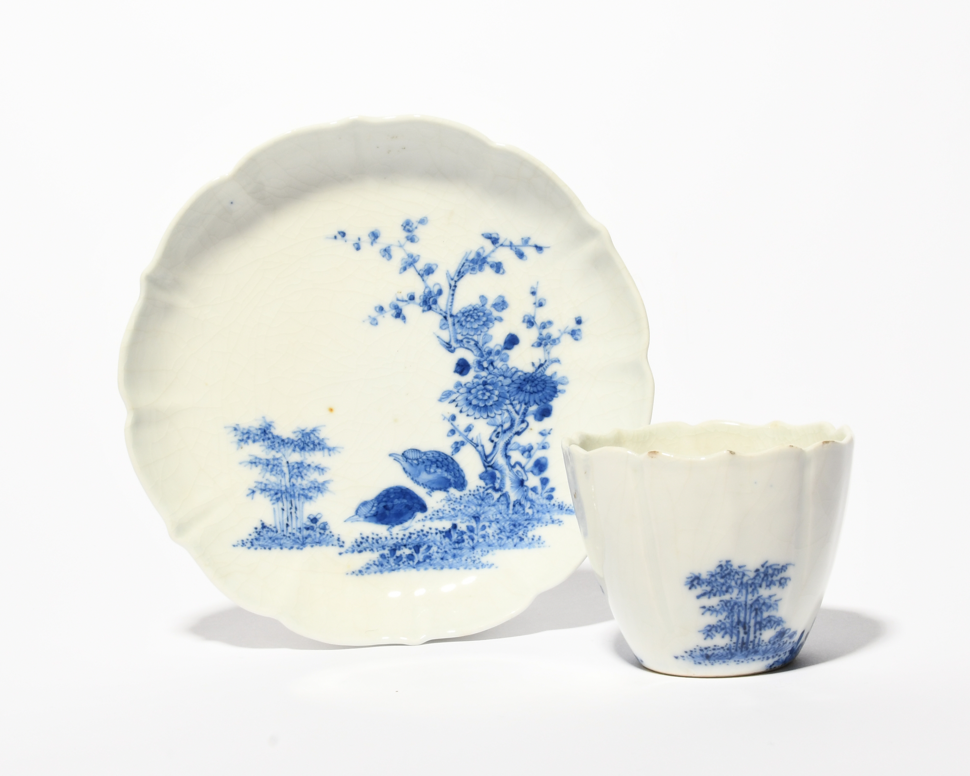 A Chinese soft-paste porcelain blue and white teabowl and saucer, mid 18th century, of lobed form, - Image 2 of 3