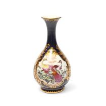 A small Chelsea bottle vase, c.1765, painted with two exotic long-tailed birds before leafy