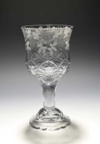 A large engraved glass goblet, c.1770-80, the slightly waisted bowl engraved with a continuous