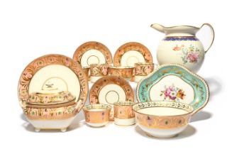A Derby part tea service, c.1815, decorated with a formal gilt and polychrome foliate border on a