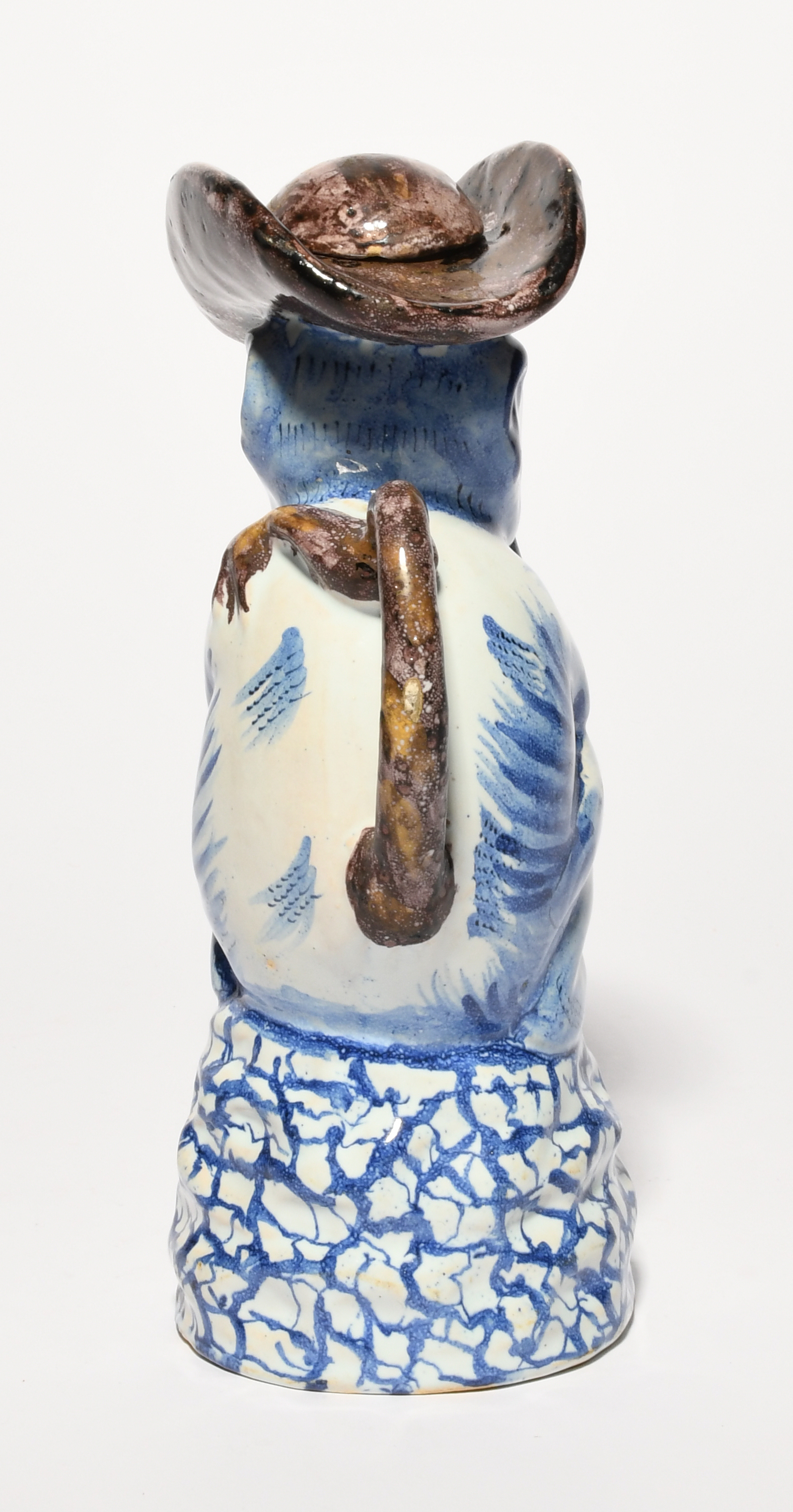 A Delft comical monkey jug and cover, mid 18th century, modelled as a monkey holding a fruit up to - Image 2 of 3