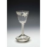 A small Beilby wine glass, c.1770, the round funnel bowl moulded to the base with vertical flutes,