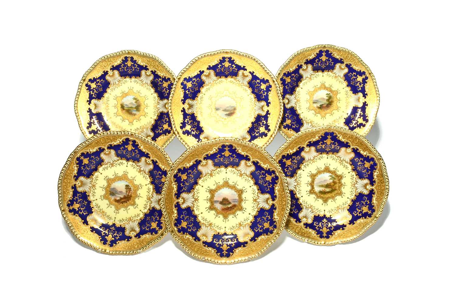 Six Coalport cabinet plates, 20th century, each painted to the well with a small landscape panel