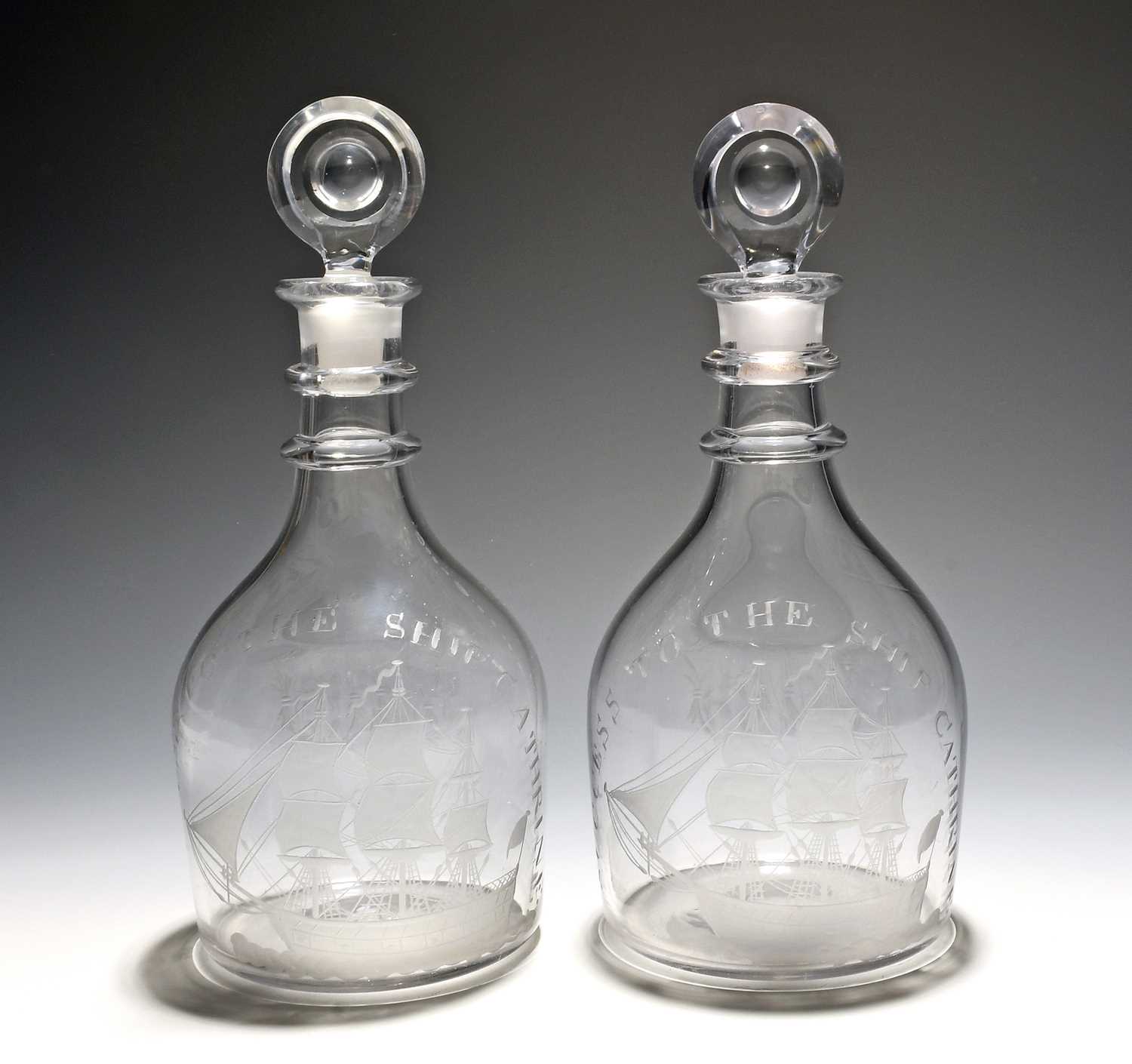 A pair of decanters and stoppers of shipping interest, late 18th/early 19th century, each engraved - Image 2 of 2