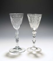 Two Dutch engraved baluster wine glasses, c.1750, one engraved with the Royal coat of arms over a