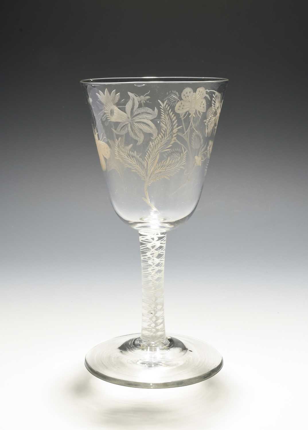 A large glass goblet of Jacobite significance, c.1760-70, the generous round funnel bowl finely