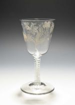 A large glass goblet of Jacobite significance, c.1760-70, the generous round funnel bowl finely