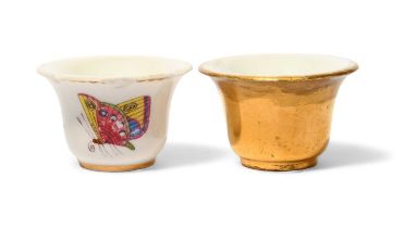 Two Sèvres rouge pots, c.1770-80, one painted with butterflies and other insects, blue interlaced Ls