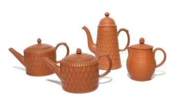 Two redware cylindrical teapots and covers, mid 18th century, a small coffee pot and cover, and a