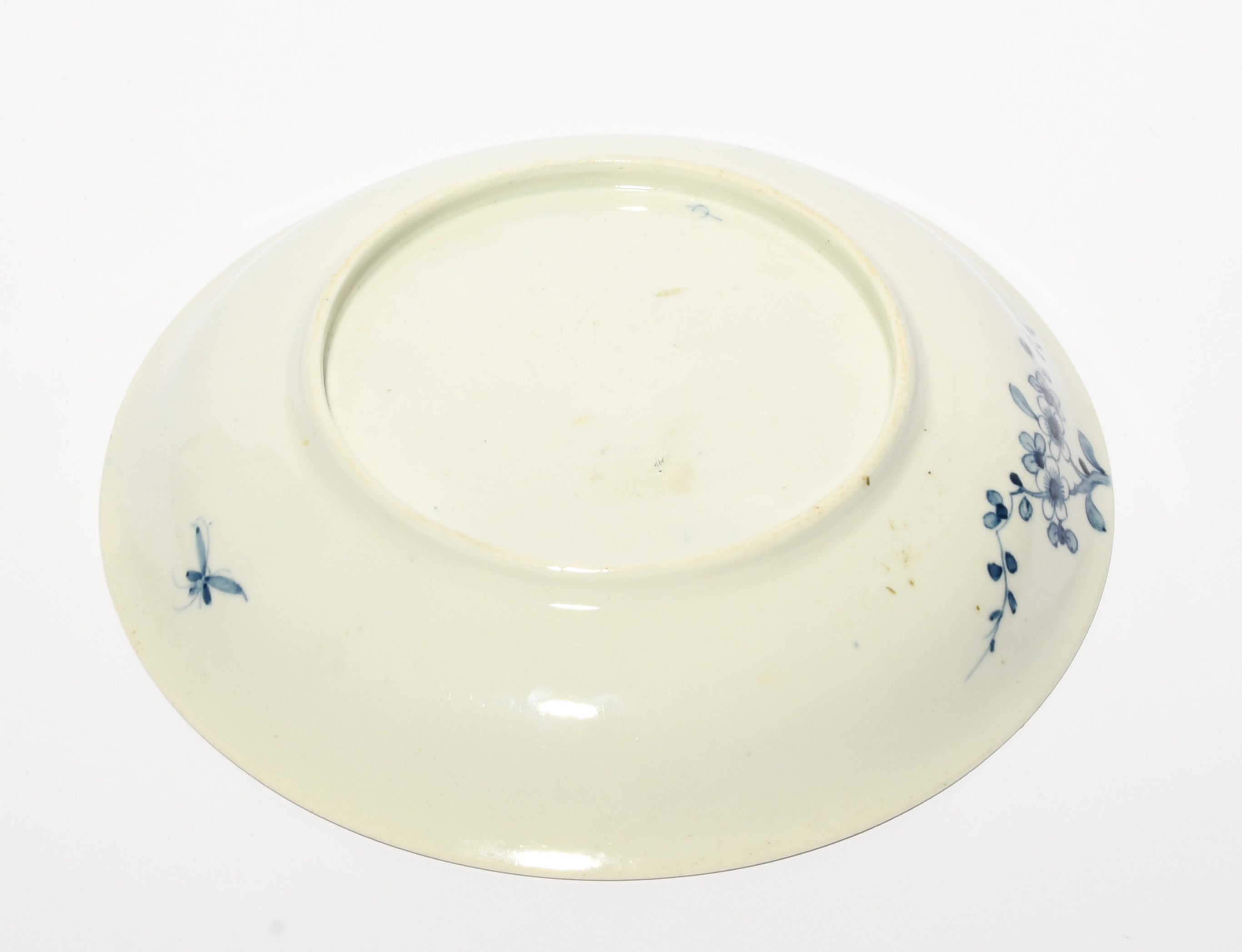 A good Worcester saucer dish, c.1758, painted in a pale blue with the Prunus Root pattern, with - Image 2 of 2