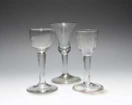 Three wine glasses, c.1750-60, one with a cup bowl, another a bell bowl, the last with a moulded