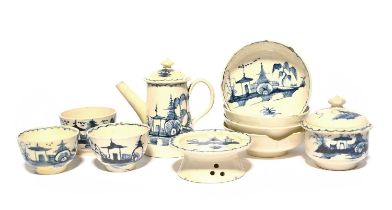 A miniature or toy creamware tea service, late 18th century, painted in blue with a pagoda