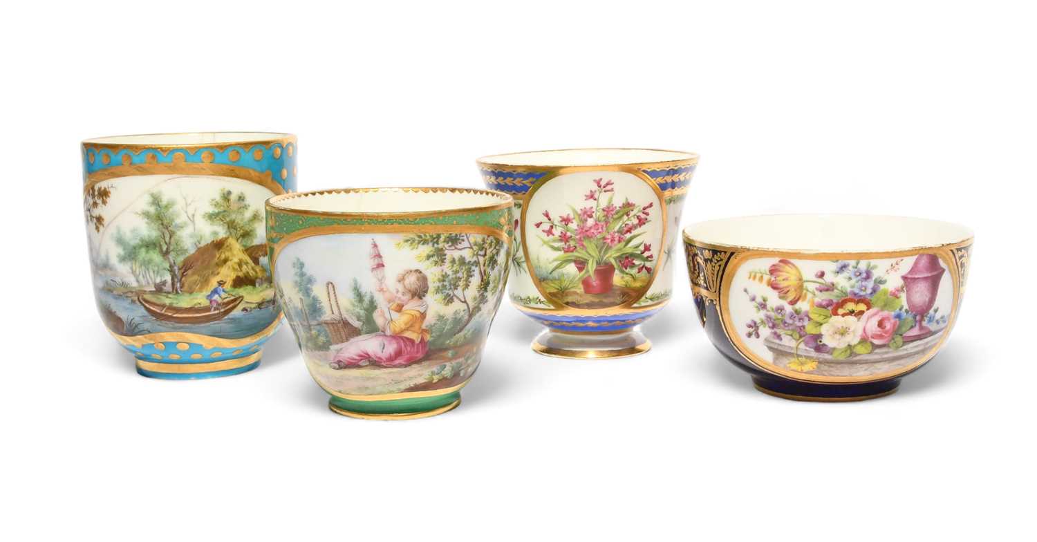 Four Sèvres cups, date codes for 1767 and 1791, one cup painted by Jean-Baptiste Tandart with