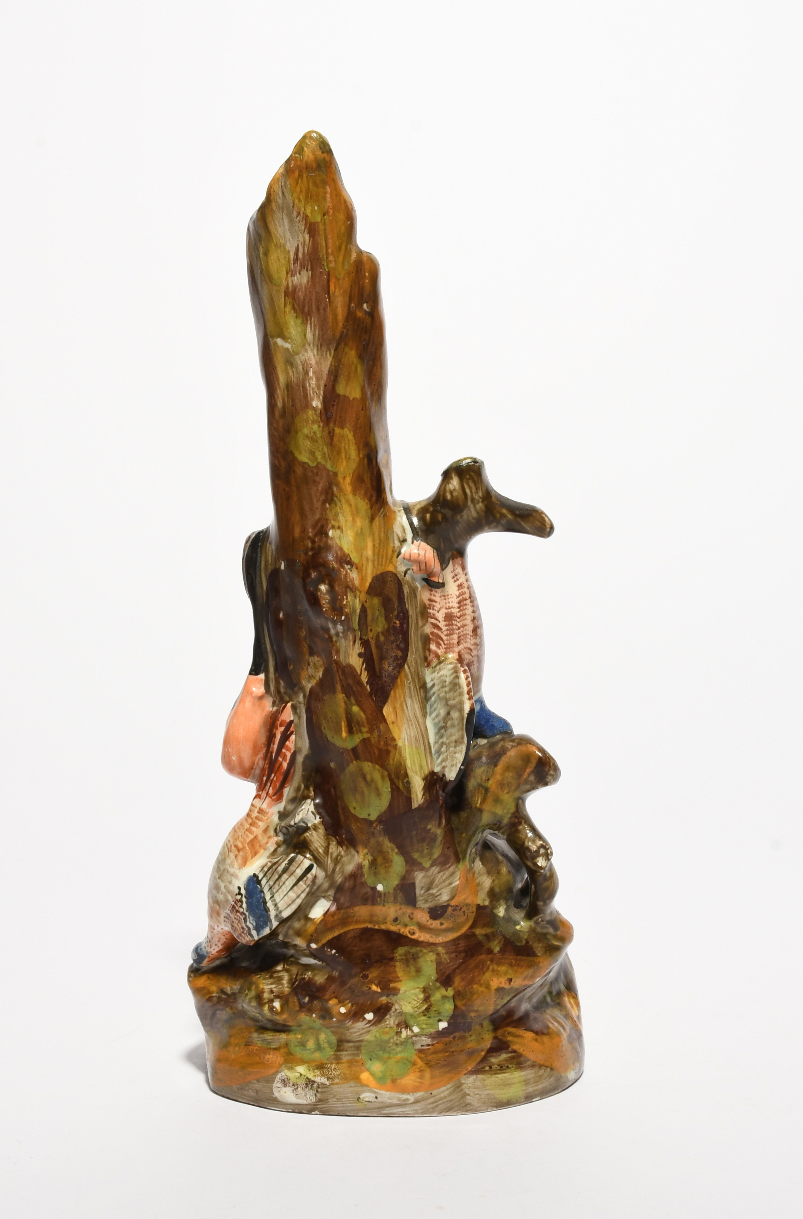 An unusual pearlware spill vase, early 19th century, formed as a hollow tree trunk draped with - Image 2 of 3