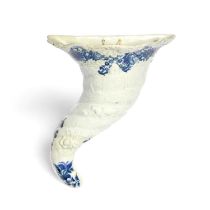 A Worcester blue and white moulded cornucopia wall pocket, c.1758, the traditional spiral horn shape