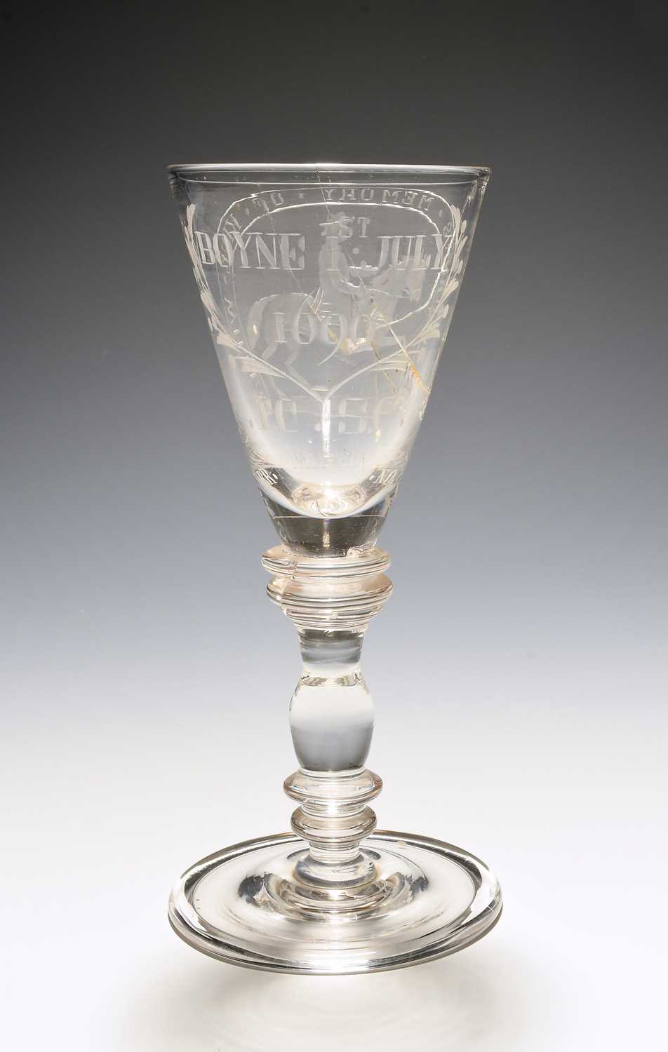 A Williamite wine glass, probably early 18th century, the flared bowl engraved with an equestrian