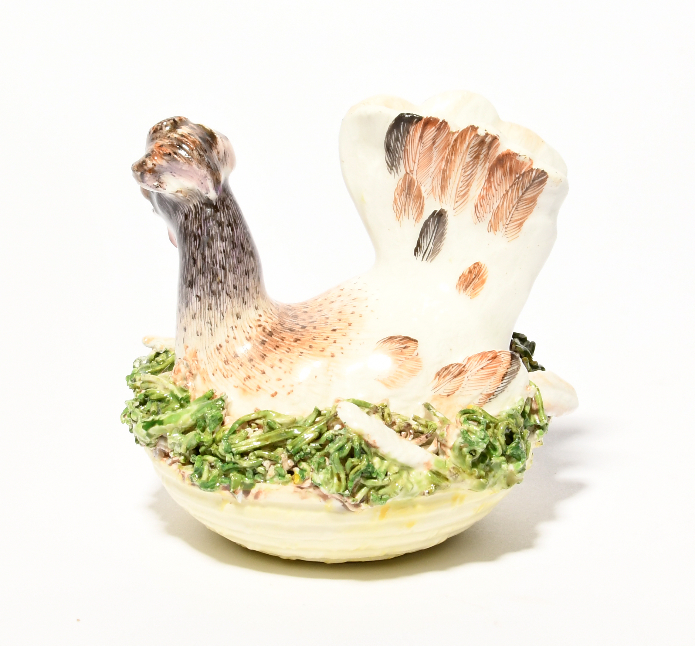 A Meissen model of a nesting chicken, mid 18th century, the hen seated in a nest of moss and - Image 2 of 2