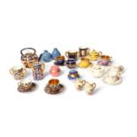 A large collection of English porcelain miniature teawares, late 19th/20th century, including a