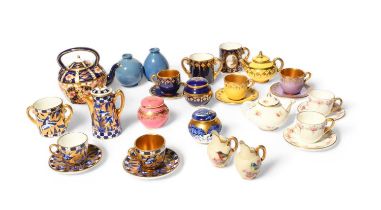 A large collection of English porcelain miniature teawares, late 19th/20th century, including a