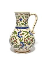 A Zsolnay Iznik style jug, late 19th century, painted in typical palette of blue, green and dark red