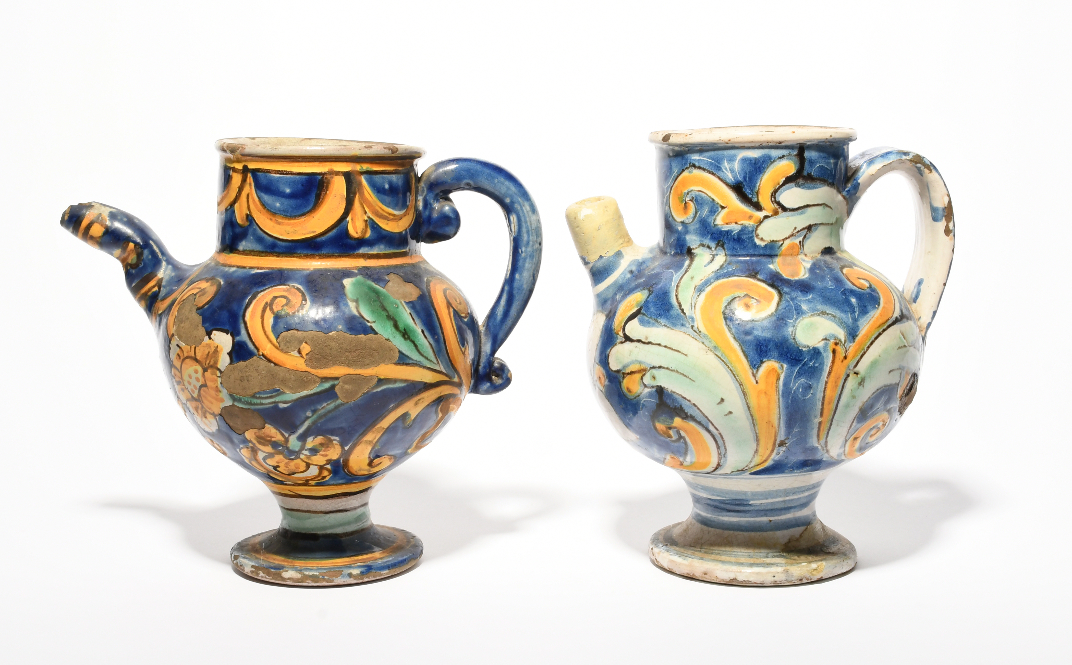 Two Caltagirone maiolica wet drug jars or ewers, 18th/19th century, typically decorated with - Image 3 of 3