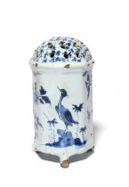 A Delft caster or sugar sifter, 18th century, of octagonal form, painted in blue with birds standing