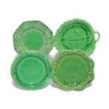 Four Staffordshire green glazed plates or dishes, 2nd half 18th century, one Brameld and moulded